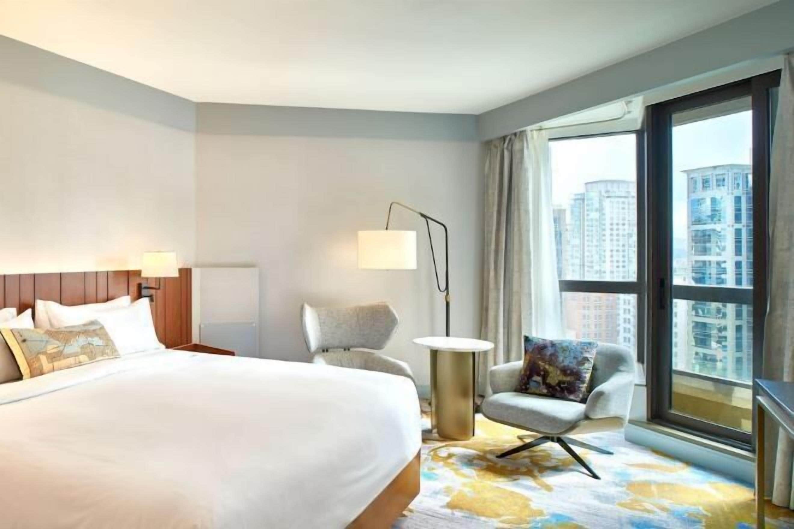 1 bedroom, hypo-allergenic bedding, down comforters, in-room safe