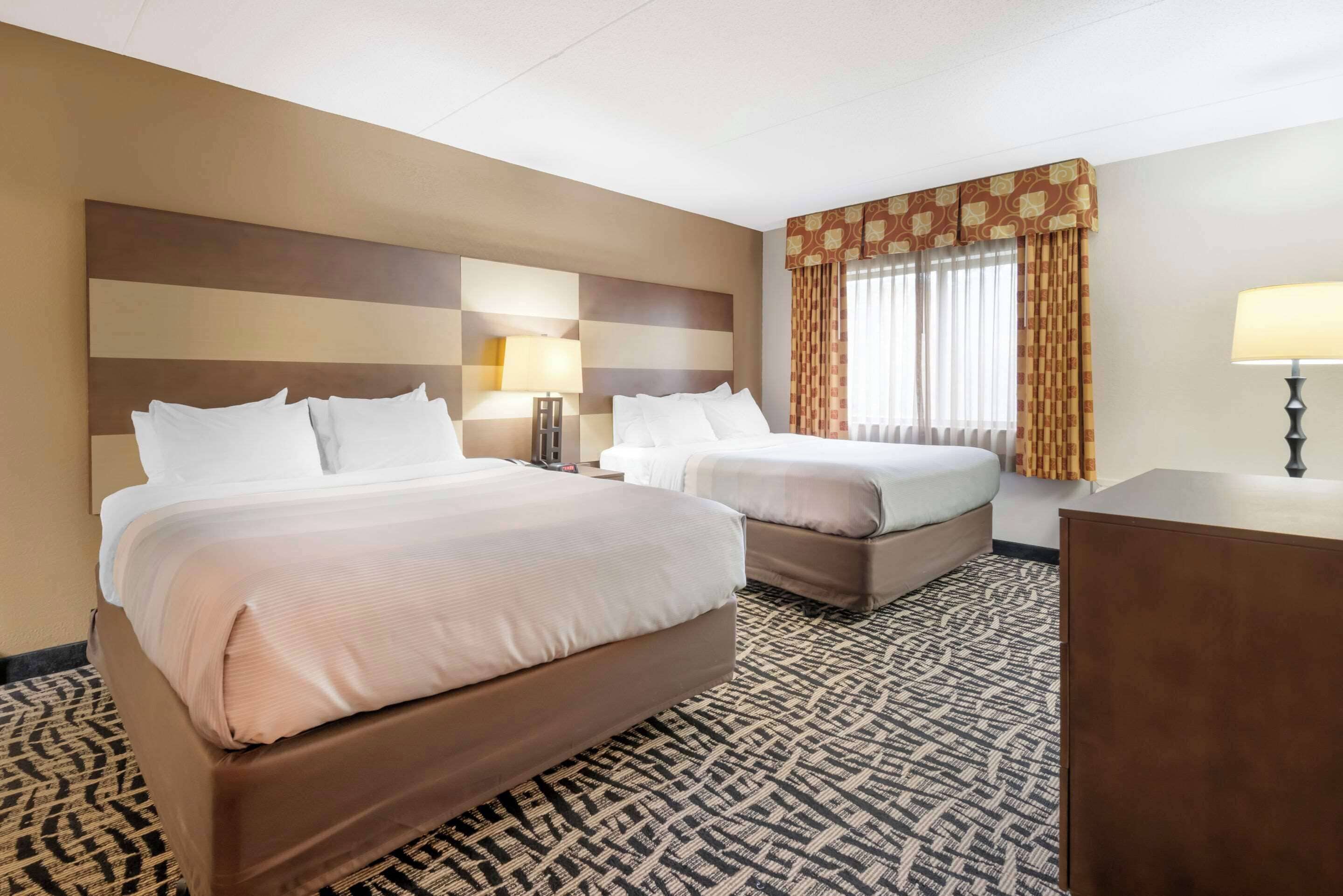 family suite, 2 queen beds | 1 bedroom, down duvets, desk, laptop workspace