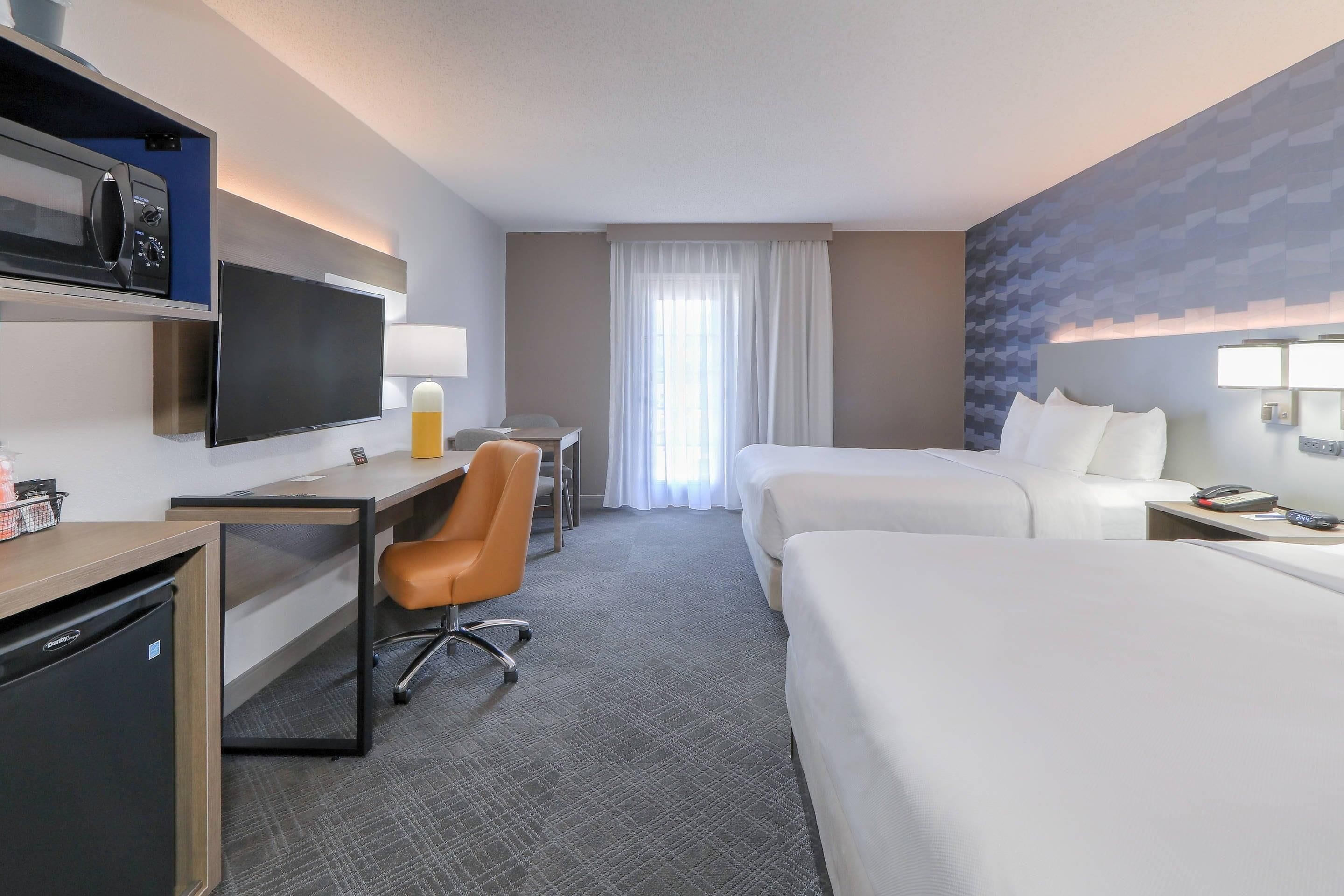 Premium bedding, in-room safe, blackout curtains, iron/ironing board