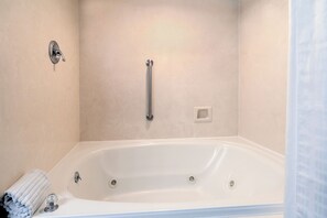 Suite, Non Smoking, Jetted Tub | Bathroom | Combined shower/tub, hair dryer, towels