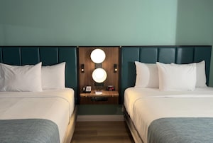 Room, 2 Queen Beds, Non Smoking | Blackout drapes, iron/ironing board, cribs/infant beds, free WiFi