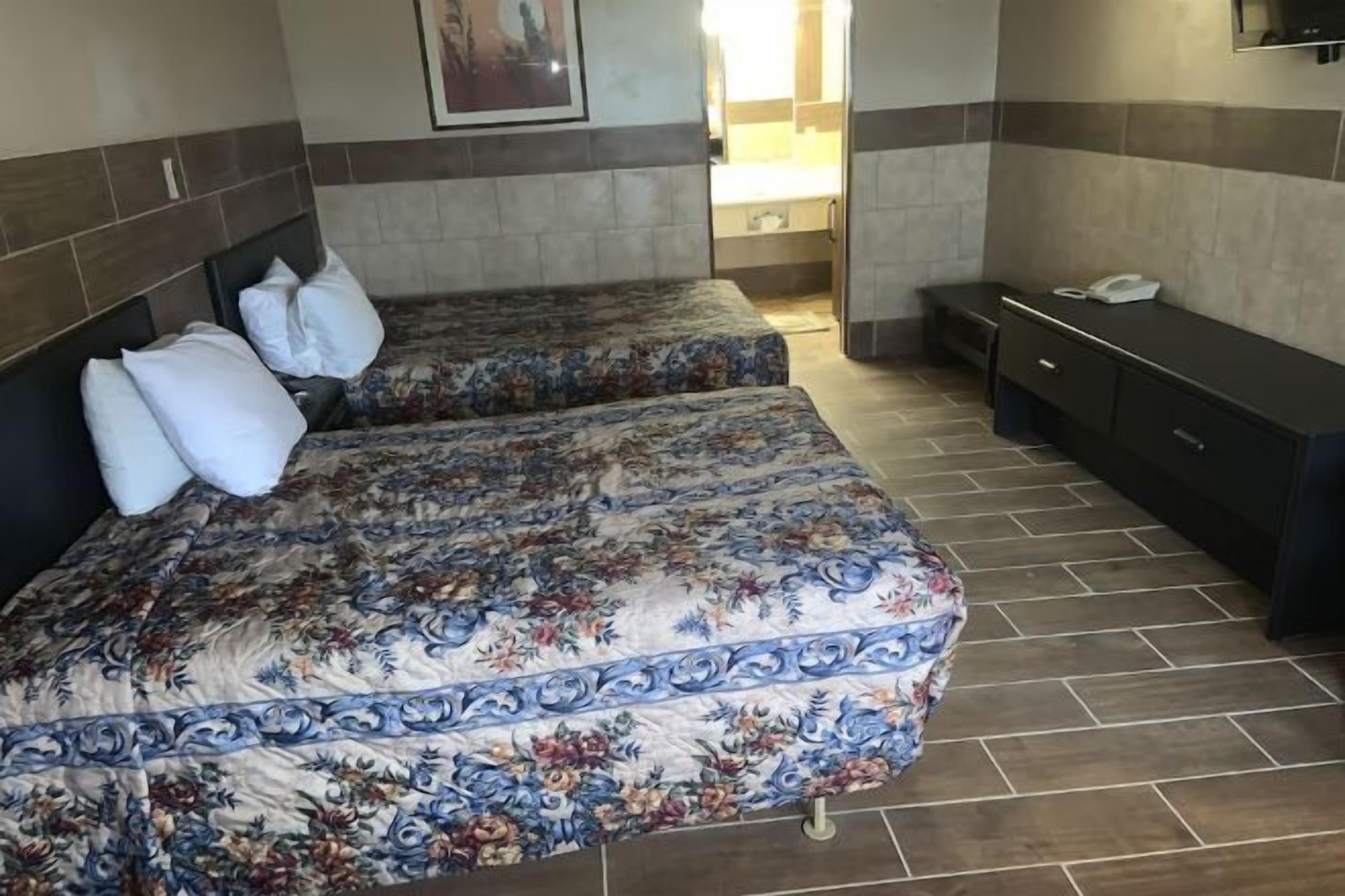 Desk, laptop workspace, free WiFi, bed sheets