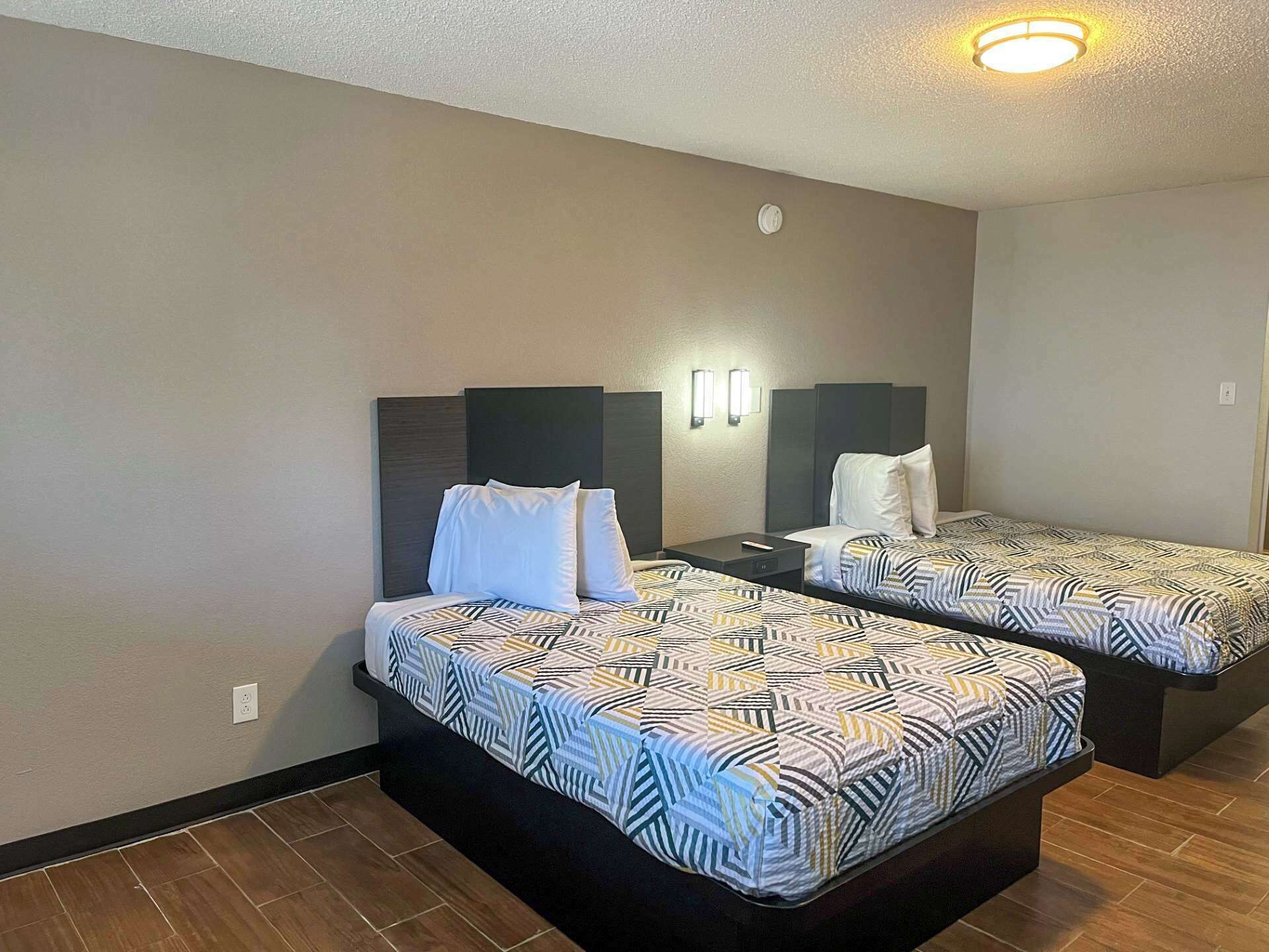 Desk, laptop workspace, free WiFi, bed sheets