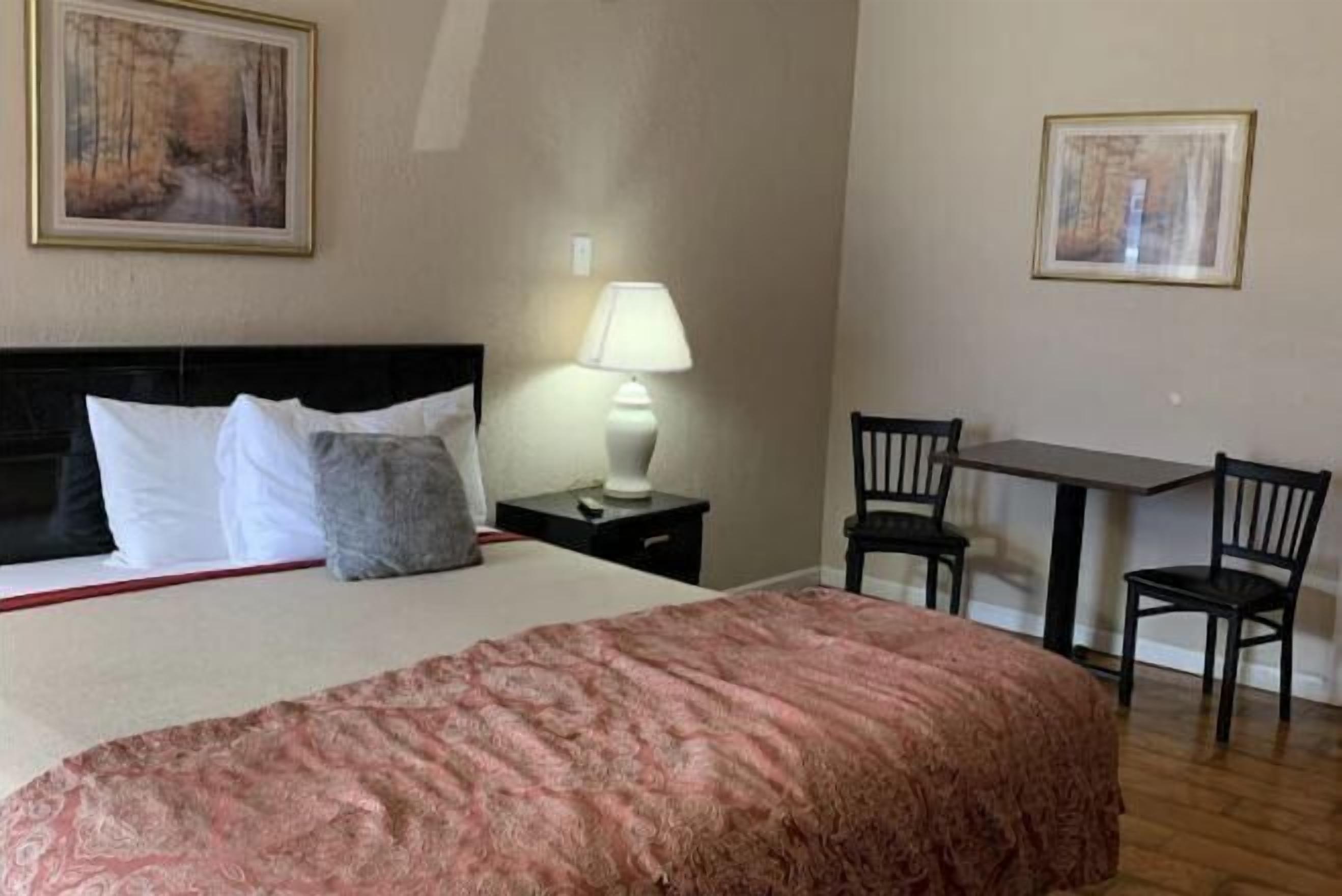 Desk, laptop workspace, free WiFi, bed sheets