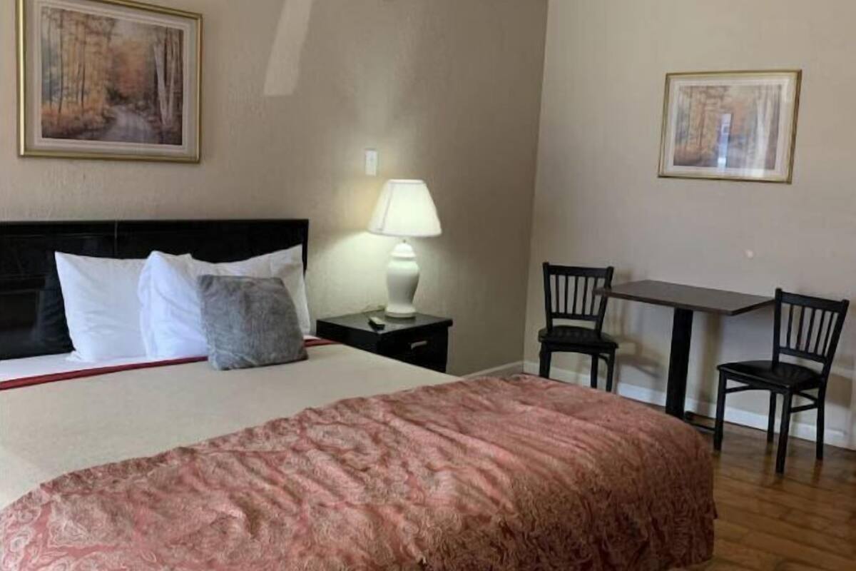 Desk, laptop workspace, free WiFi, bed sheets