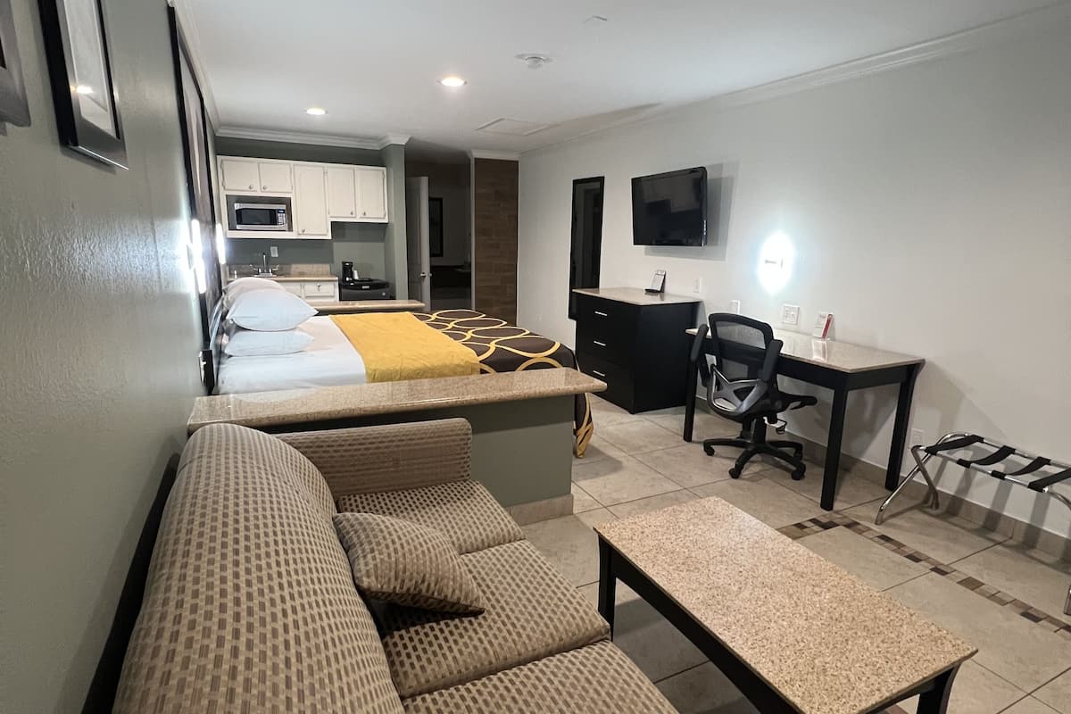 suite, 1 king bed, non smoking | desk, iron/ironing board, rollaway beds, free wifi