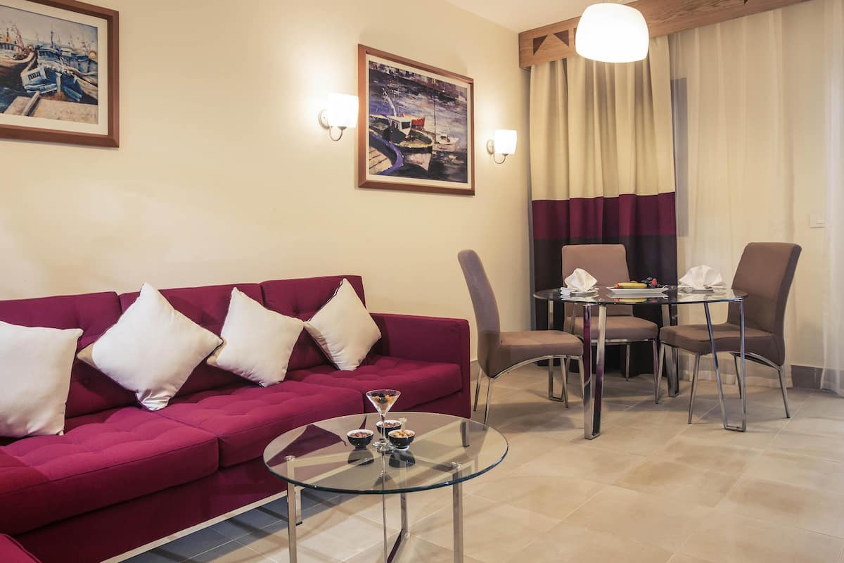 Superior Suite, 1 King Bed (Pool Side) | Minibar, in-room safe, iron/ironing board, bed sheets