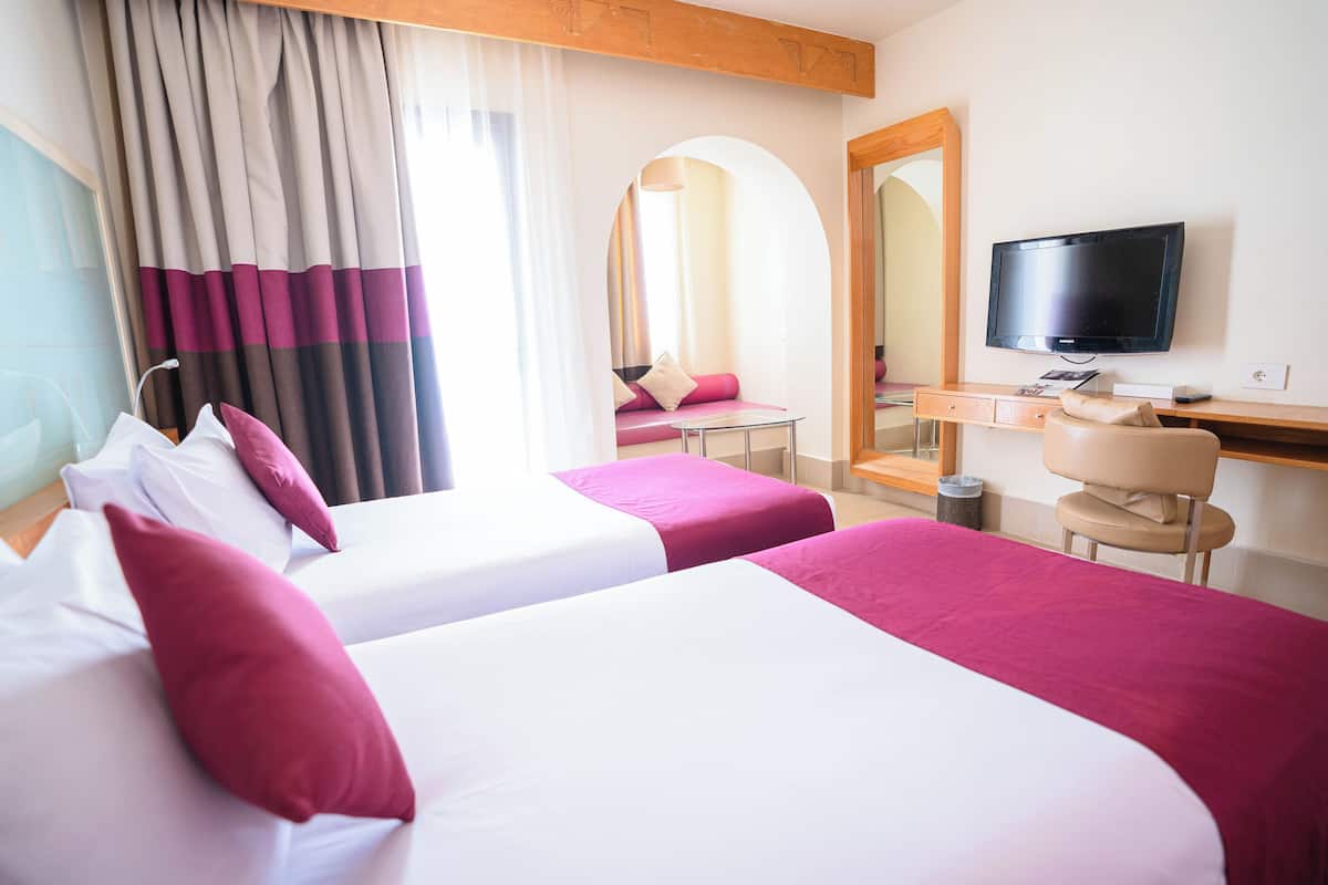 Een minibar, een kluis op de kamer, een strijkplank/strijkijzer