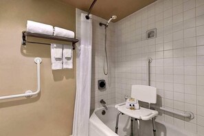 Combined shower/tub, designer toiletries, hair dryer, towels
