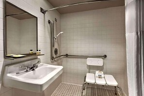 Combined shower/tub, designer toiletries, hair dryer, towels