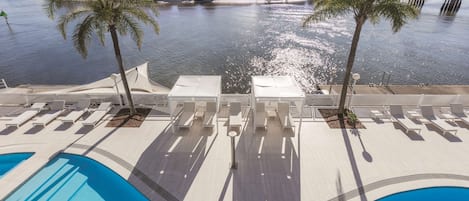 Outdoor pool, free cabanas, pool umbrellas