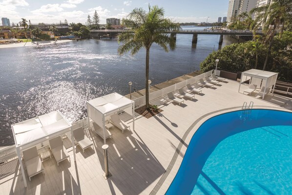 Outdoor pool, free pool cabanas, pool umbrellas