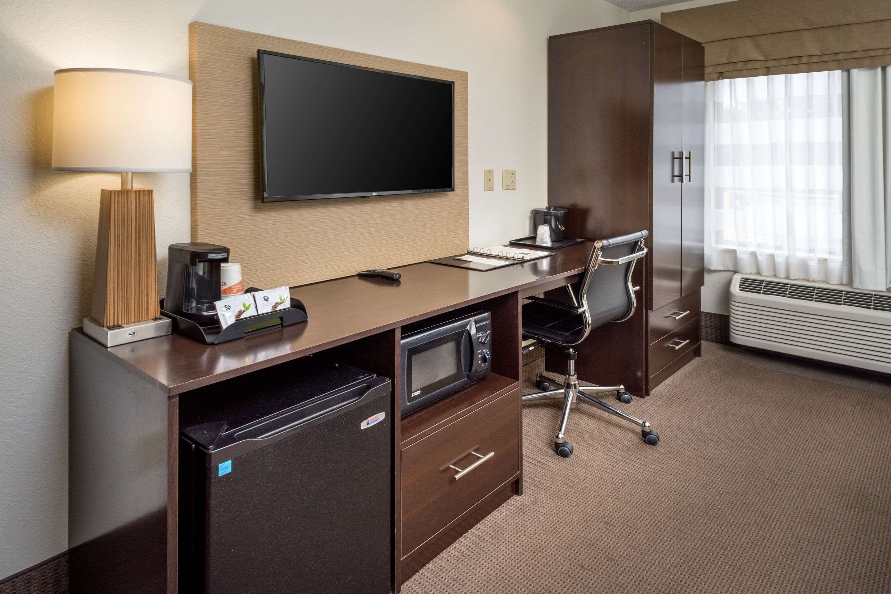 desk, blackout curtains, iron/ironing board, free cots/infant beds