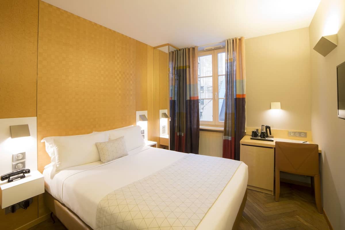 Ropa de cama de alta calidad y minibar