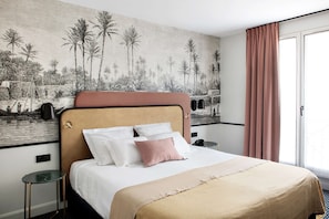 Habitación Confort, 1 cama King size, para no fumadores | Minibar, caja de seguridad en la habitación y decoración personalizada