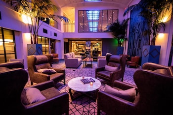Hotel entrance and lobby at Hotel Theodore Seattle Downtown, Tapestry by Hilton