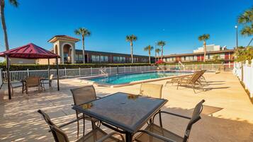 Outdoor pool, open 10:00 AM to 8:00 PM, pool umbrellas, sun loungers