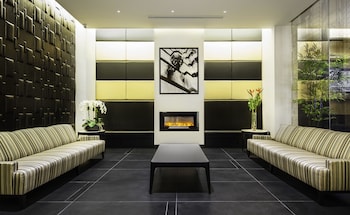 Sitting area in hotel lobby at The Hotel @ Fifth Avenue