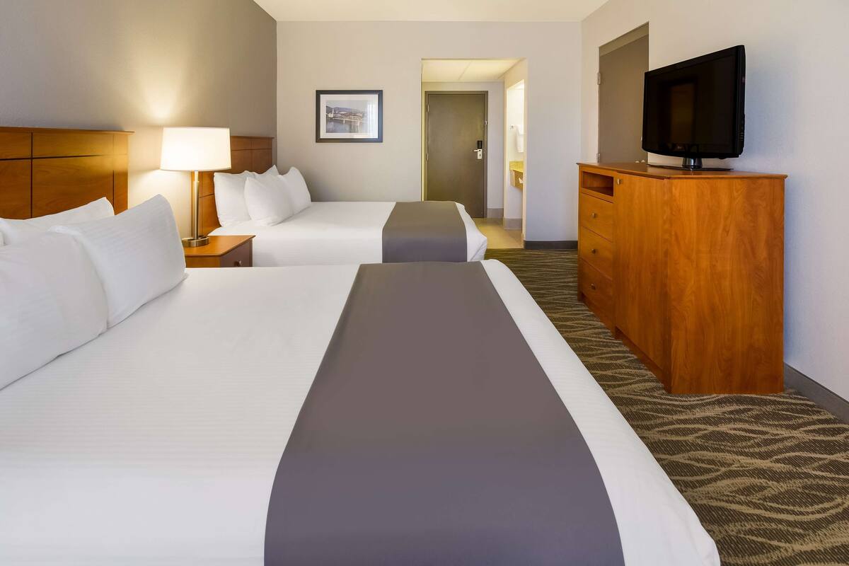 standard room, 2 queen beds, non smoking, refrigerator & microwave | laptop workspace, iron/ironing board, free cots/infant beds