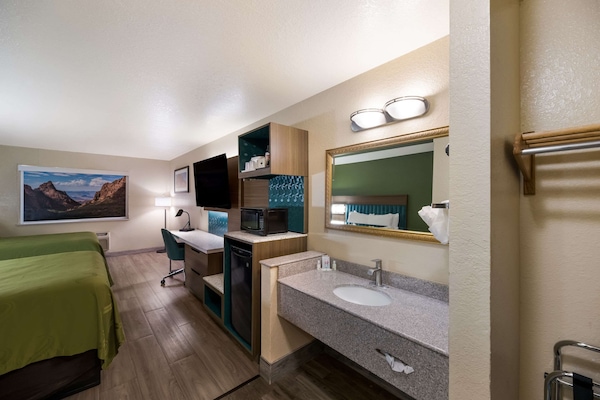 Pillow-top beds, desk, laptop workspace, blackout curtains