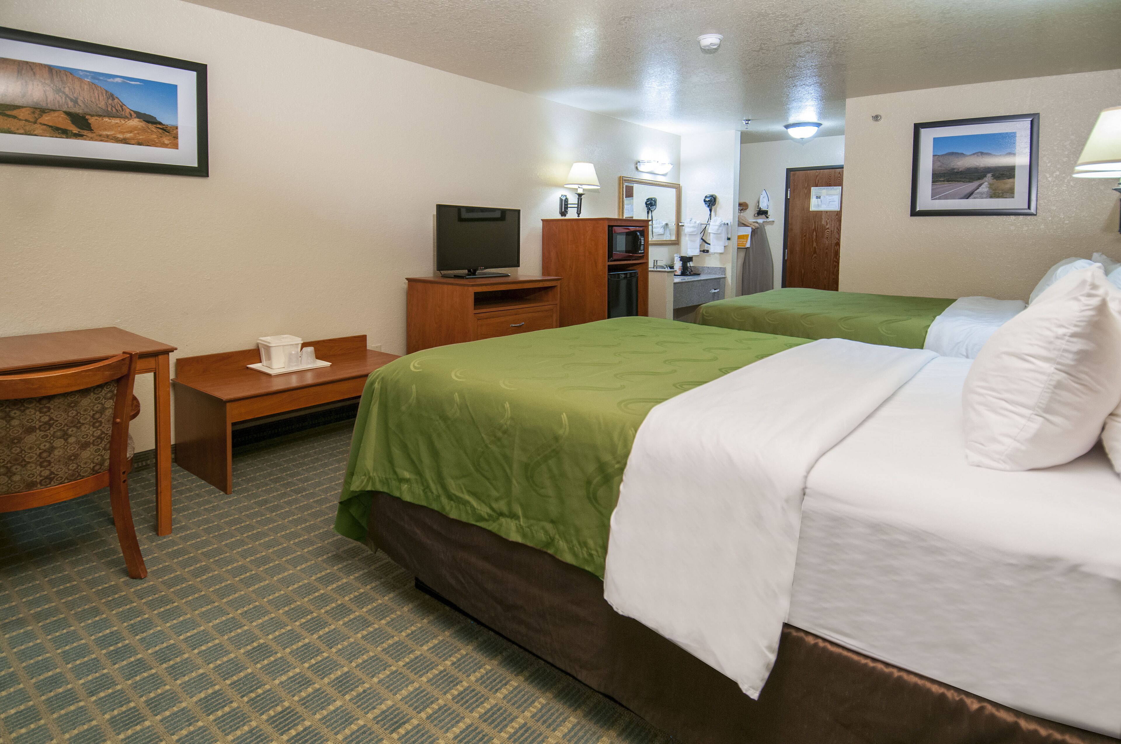 standard room, 2 queen beds, non smoking | pillow-top beds, desk, laptop workspace, blackout curtains