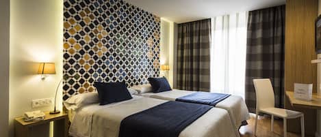 Memory foam beds, minibar, in-room safe, desk