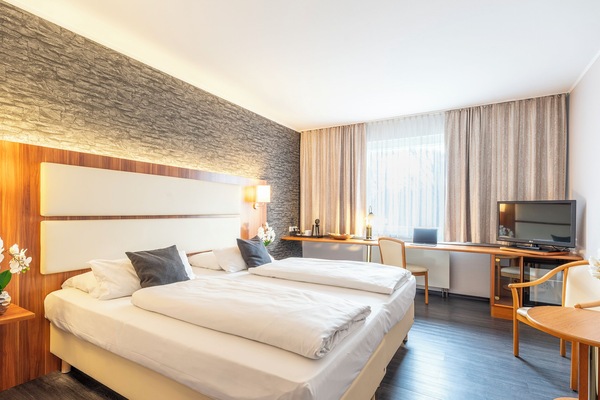 Kamar Double Comfort | Didekorasi berbeda-beda dan dilengkapi dengan perabotan berbeda-beda