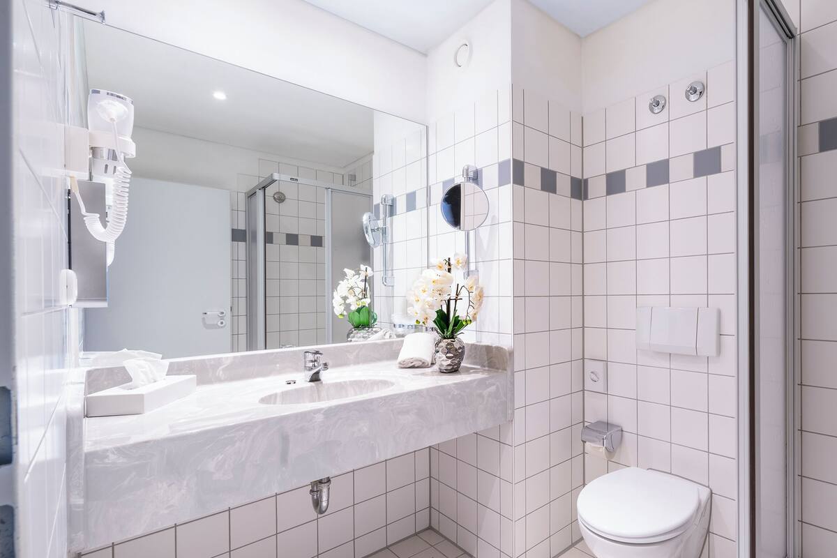 Hair dryer, towels, soap, shampoo