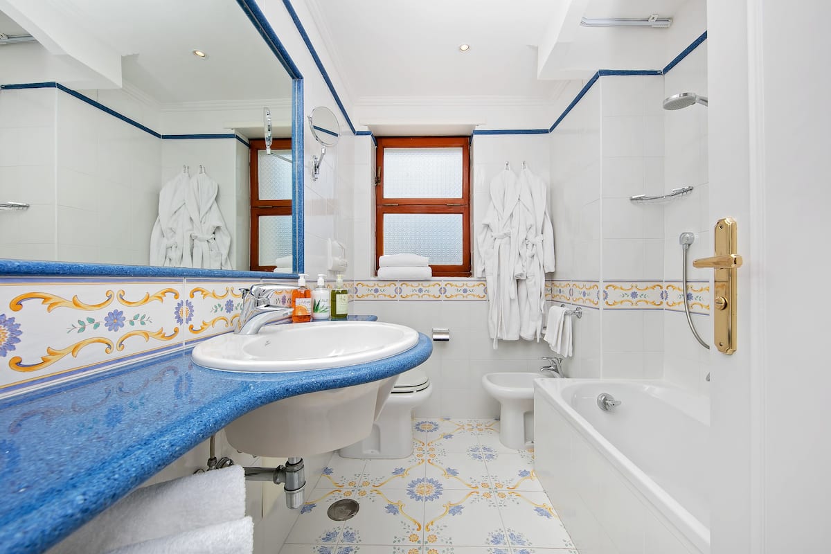 shower, free toiletries, hair dryer, bathrobes