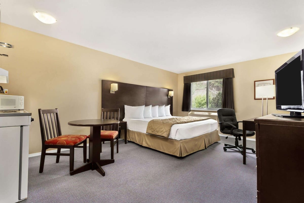 Premium bedding, desk, blackout curtains, iron/ironing board