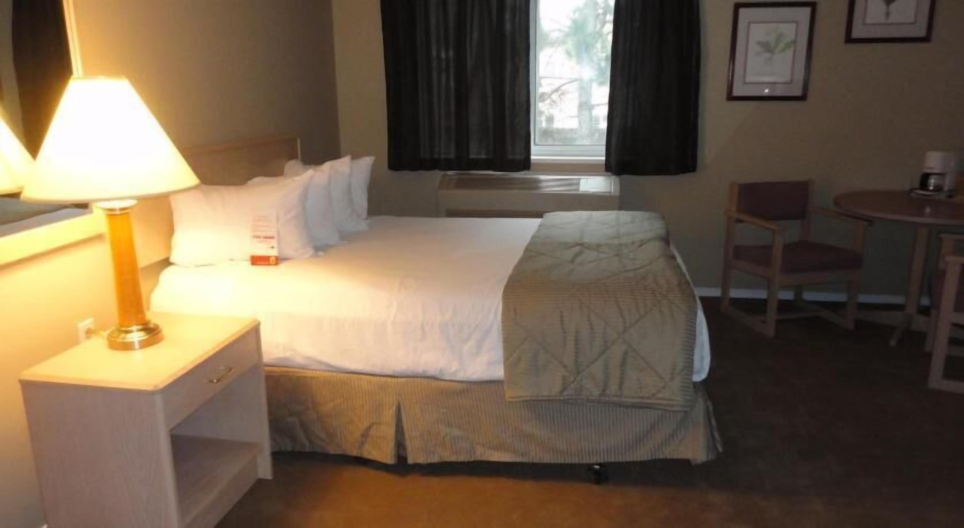Premium bedding, desk, blackout curtains, iron/ironing board
