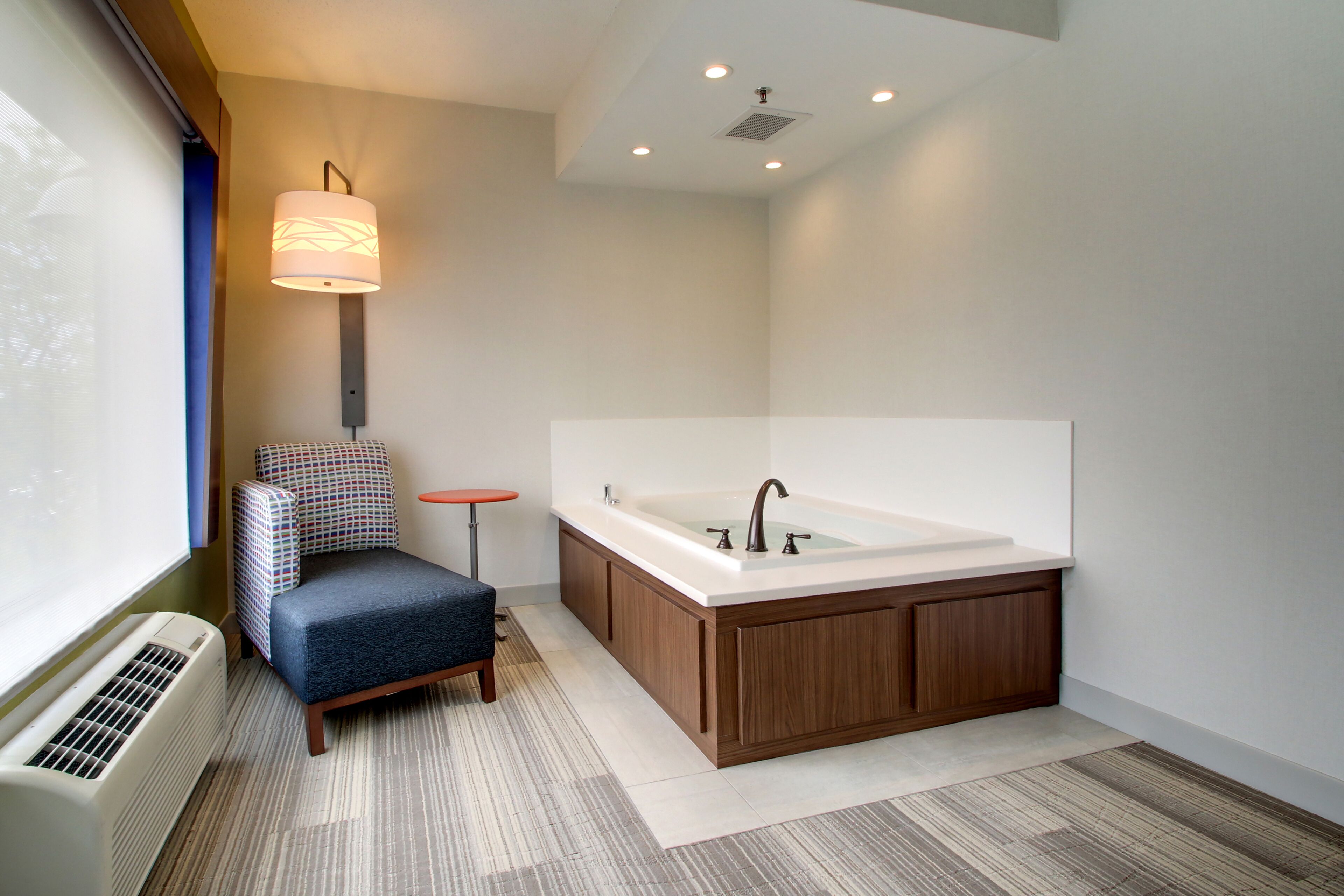 suite, 1 bedroom, jetted tub | 1 bedroom, in-room safe, desk, iron/ironing board