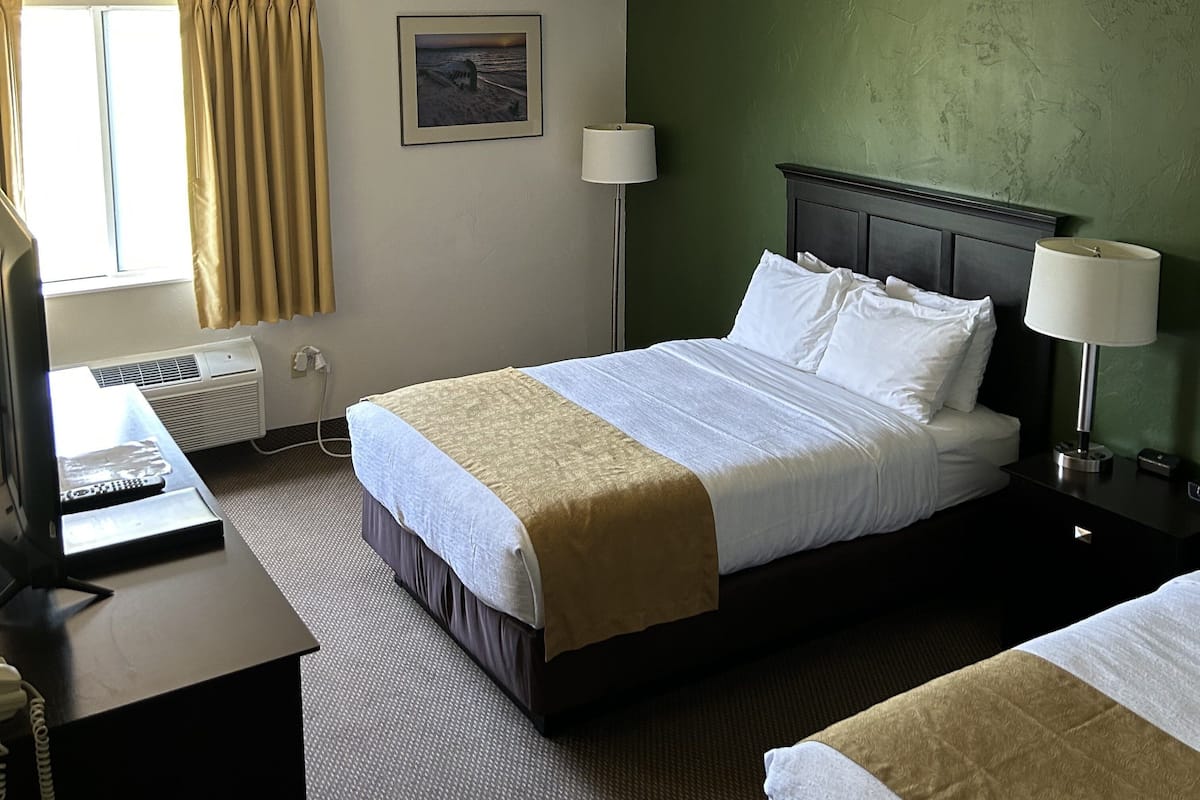 room, 2 double beds, non smoking | in-room safe, individually decorated, individually furnished, desk