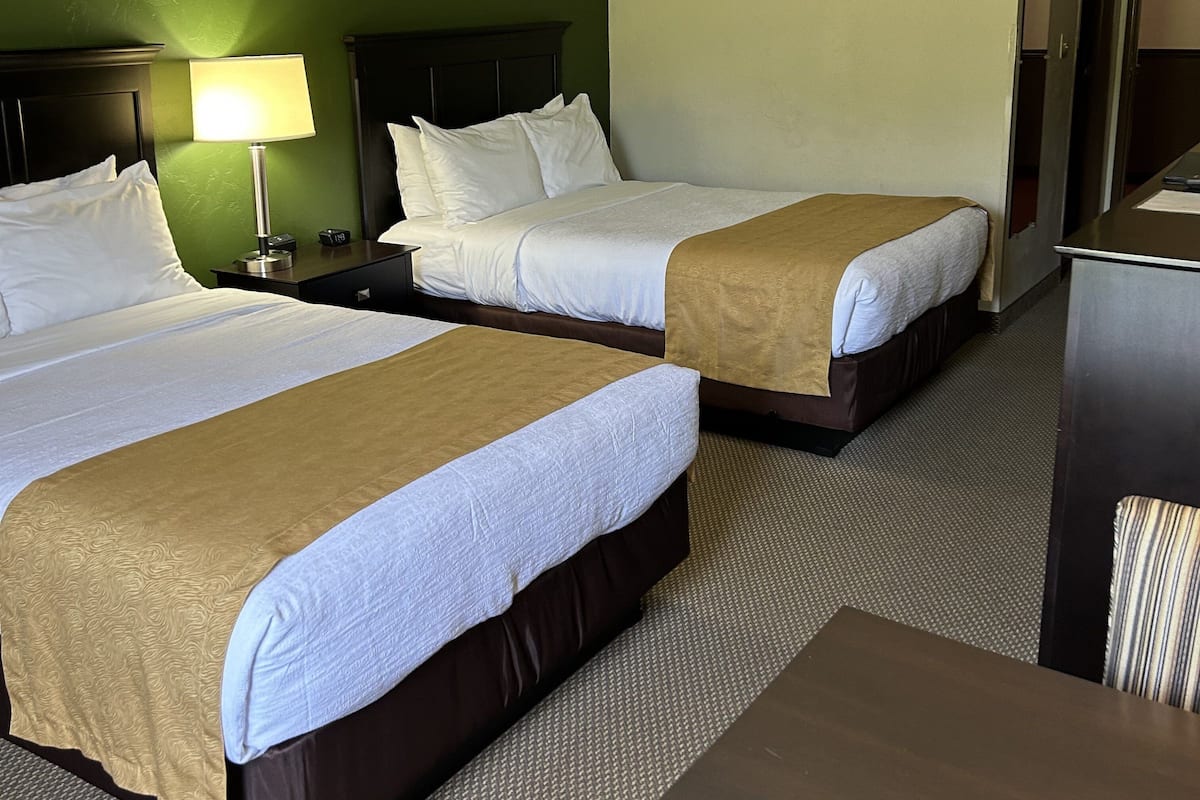 Room, 2 Double Beds, Non Smoking | In-room safe, individually decorated, individually furnished, desk