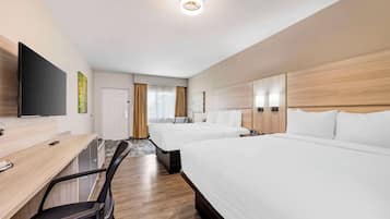 Habitación estándar, 2 camas de matrimonio, no fumadores | Escritorio, cortinas opacas, tabla de planchar con plancha y wifi gratis