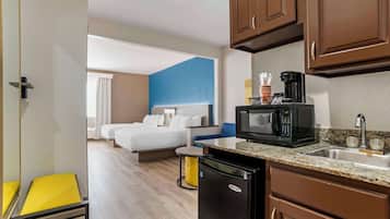 Suite, 2 Queen Beds, Non Smoking | Desk, laptop workspace, iron/ironing board, free WiFi