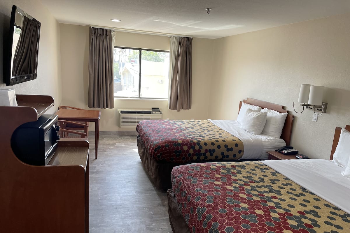 Standard Room, 2 Queen Beds, Non Smoking | Desk, iron/ironing board, free WiFi, bed sheets