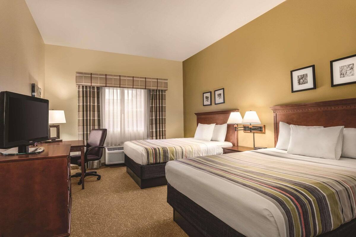 Hypo-allergenic bedding available, down comforters, desk, soundproofing
