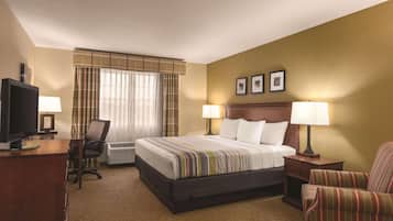 Suite, 1 King Bed, Non Smoking, Jetted Tub | Hypo-allergenic bedding, down comforters, desk, soundproofing