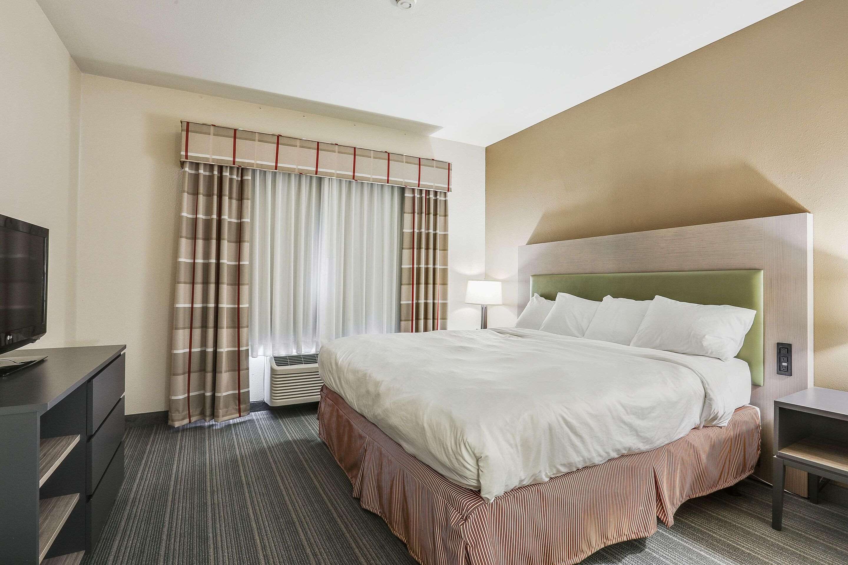 premium bedding, blackout curtains, iron/ironing board