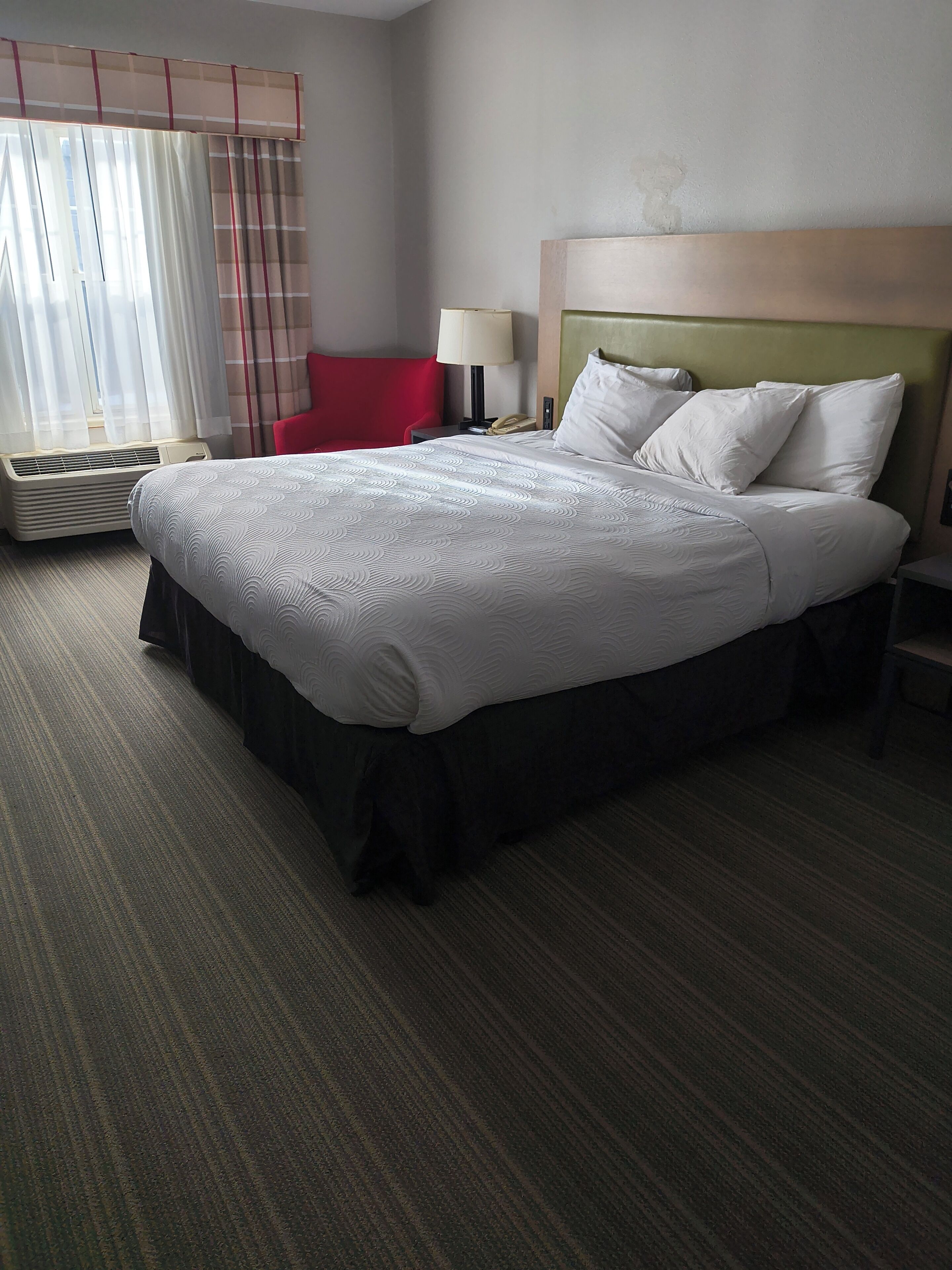 Premium bedding, blackout drapes, iron/ironing board