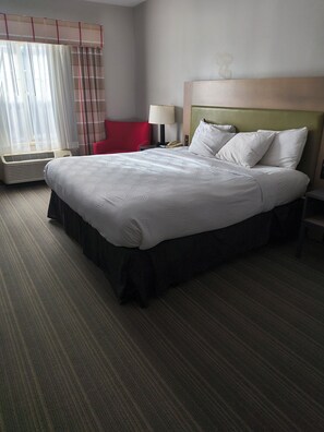 Premium bedding, blackout drapes, iron/ironing board
