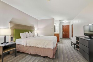 Premium bedding, blackout curtains, iron/ironing board