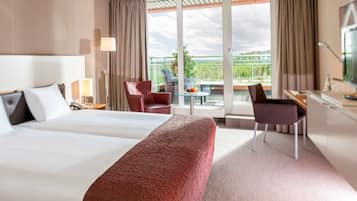 Phòng Suite Junior | Bộ đồ giường kháng dị ứng, két bảo mật tại phòng, bàn, màn/rèm cản sáng