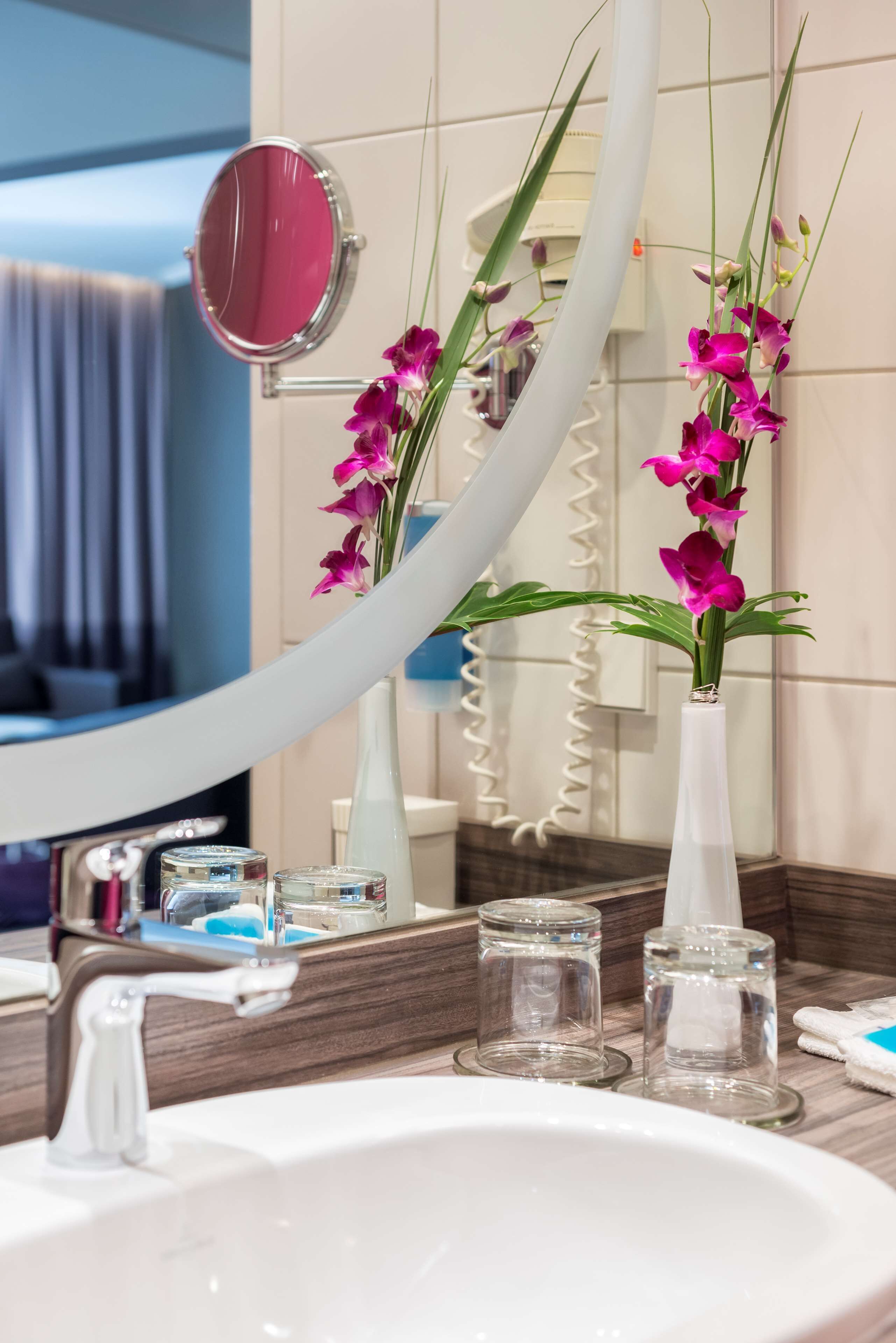 shower, eco-friendly toiletries, hair dryer, towels