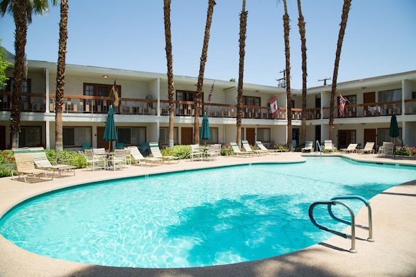 Outdoor pool, a heated pool, pool umbrellas