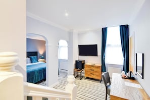 Economy Double Room, 1 Double Bed (UA Double Wet Room) | Living area | 32-inch LCD TV with digital channels, TV