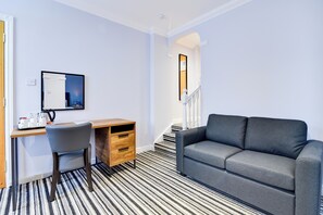 Economy Double Room, 1 Double Bed (UA Double Wet Room) | Living area | 32-inch LCD TV with digital channels, TV
