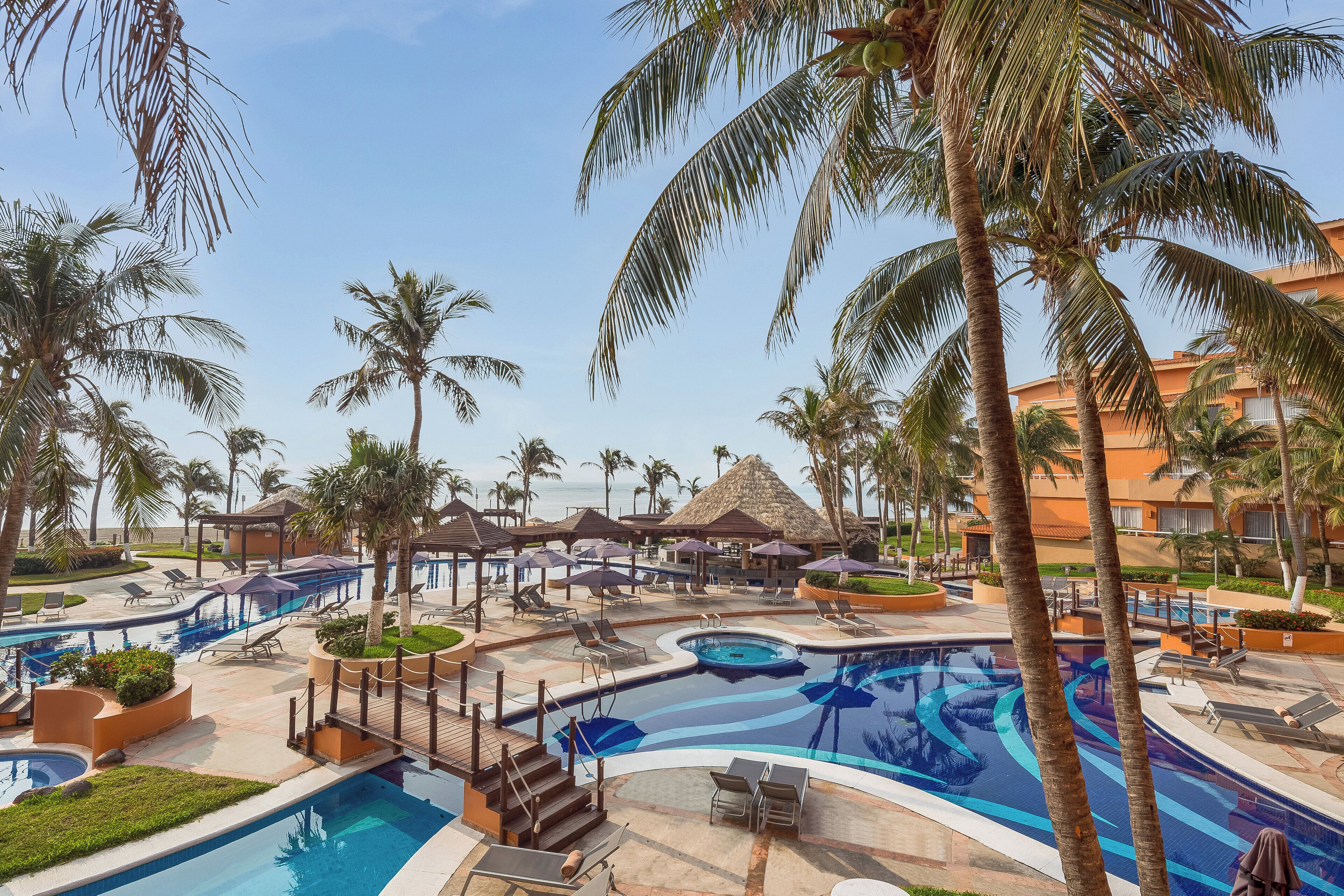 indoor pool, outdoor pool, open 9:00 am to 8:00 pm, pool umbrellas