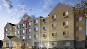 A Fairfield Inn & Suites by Marriott hotel with a central entrance, multiple floors, and a parking lot. - Fairfield Inn & Suites Colorado Springs Air Force Academy (Colorado Springs)